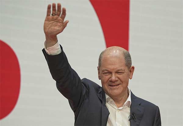  Scholz's party approves deal for new German coalition govt

