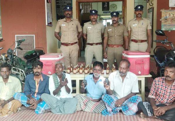  'வாக்கி டாக்கி' பயன்படுத்தி மது விற்ற 7 பேர் சிக்கினர்