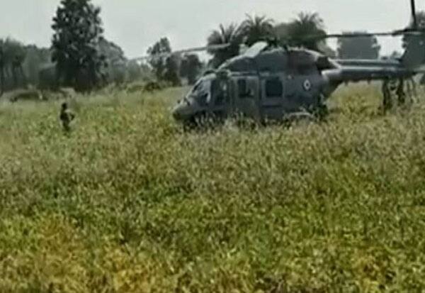 IAF's ALH Dhruv helicopter makes emergency landing in MP's Bhopal    வயலில் தரையிறங்கிய ஹெலிகாப்டர்: காண குவிந்த மக்கள் 